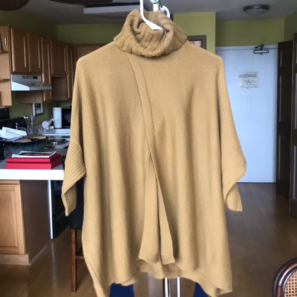 DVF olive turtleneck w/ slot detail